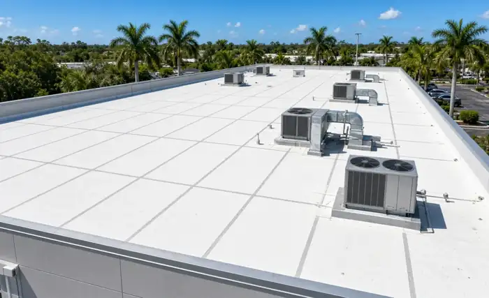 White TPO membrane roof on a flat commercial building